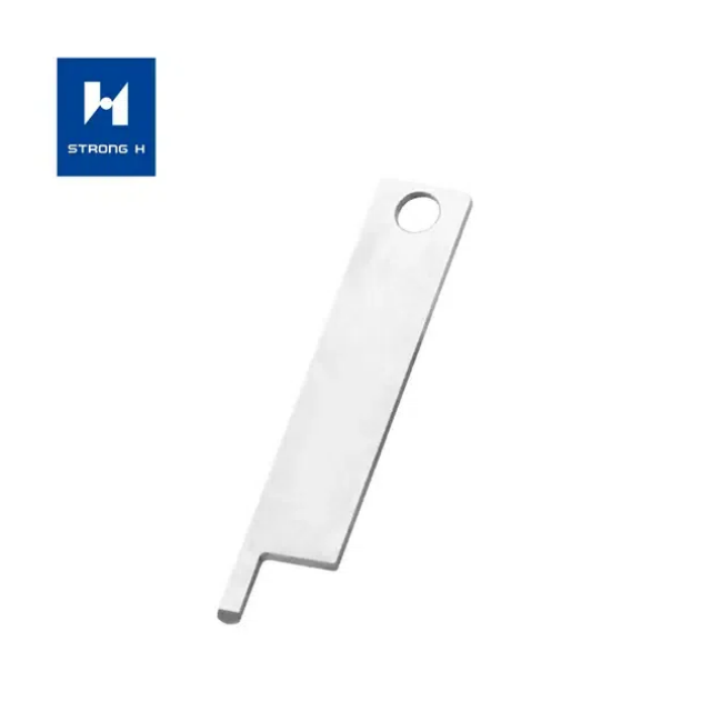 Une machine à coudre a-t-elle un couteau ?